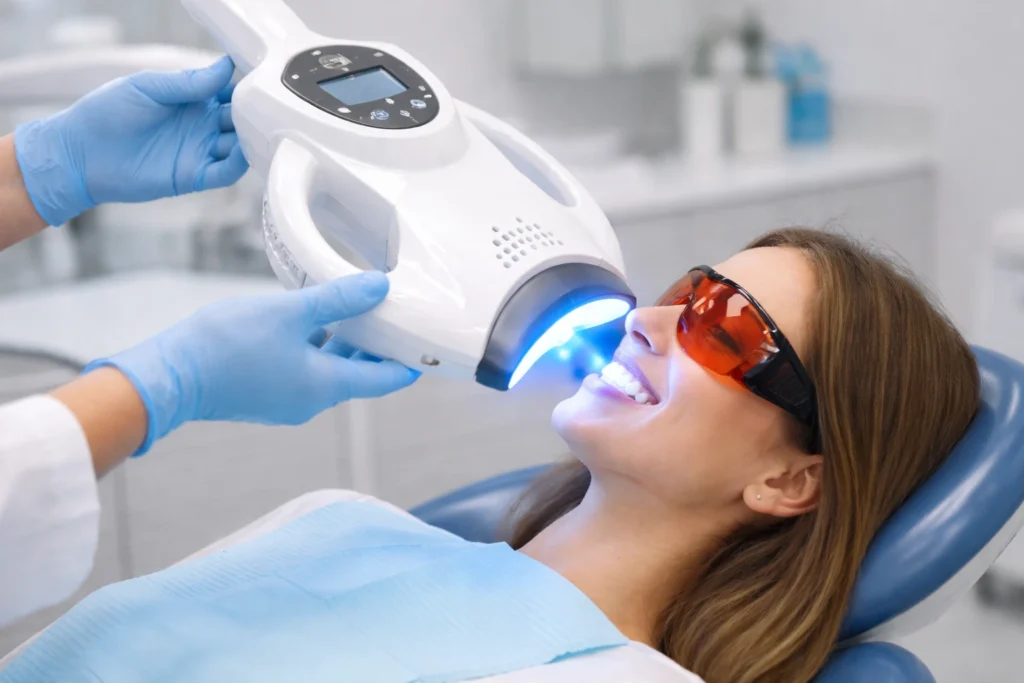 Professional teeth whitening treatment using LED light in dental clinic